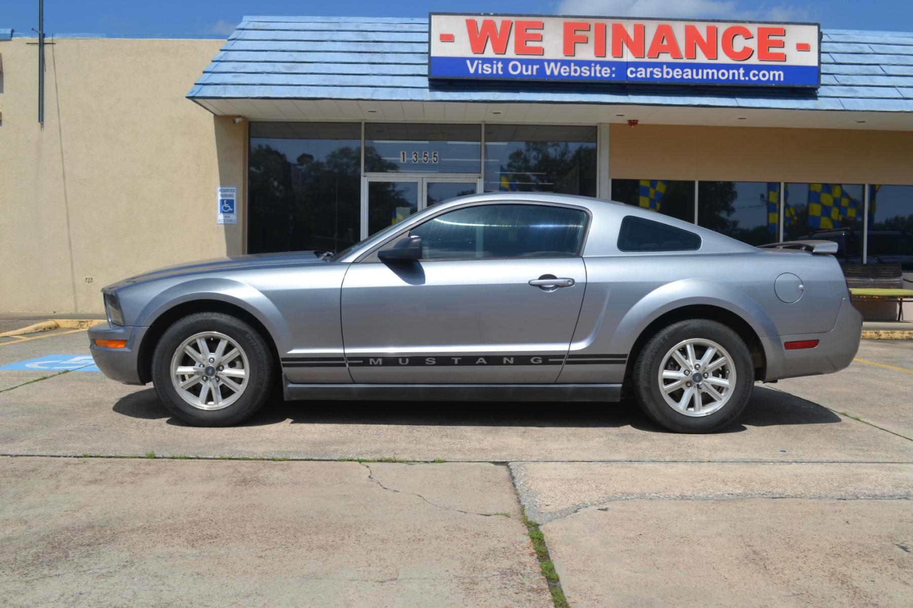 2006 Tungsten Grey Metall /Light Graphite Cloth Ford Mustang V6 Deluxe Coupe (1ZVFT80N665) with an 4.0L V6 SOHC 12V engine, located at 1355 North 11th Street, Beaumont, 77702, (409) 832-0006, 30.094290, -94.130096 - Photo #1